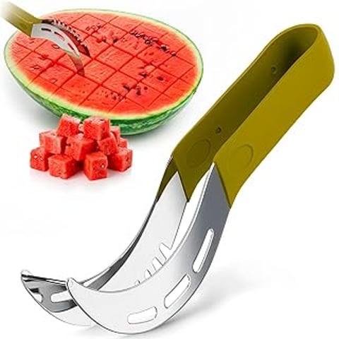A watermelon cutter with a green handle.