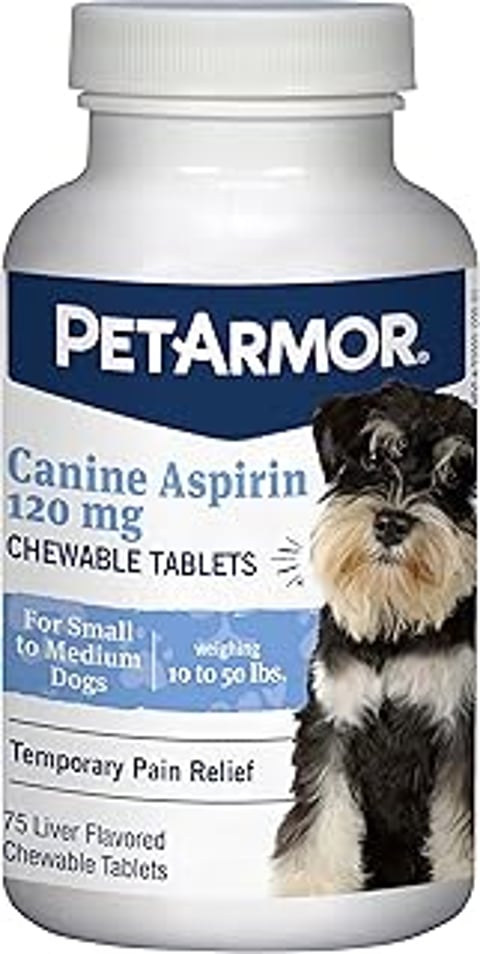 A black and white dog with a beard is on the label of a canine aspirin bottle.