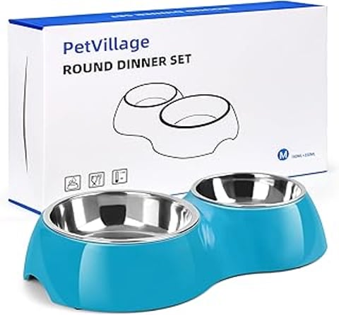 Two bowls of food for dogs.