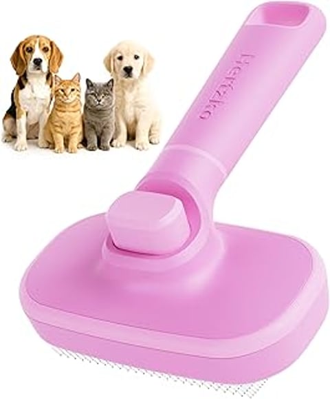 A pink Hertzko brush for cats and dogs.