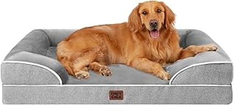 A large brown dog is laying on a dog bed.